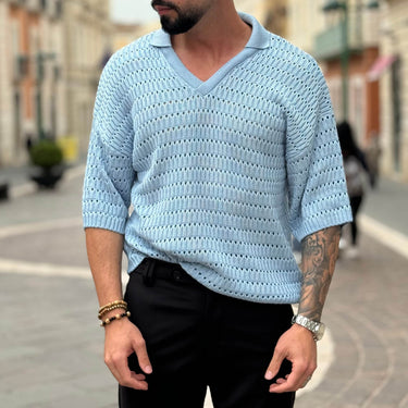 Polo azzurra scollo a V traforata - FLAG STORE